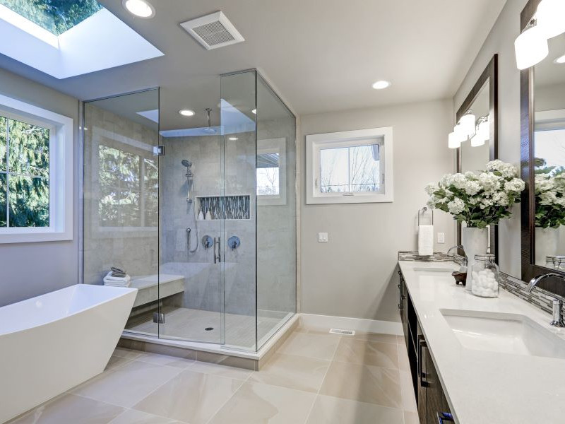 freestanding tub, glass shower enclosure, premium vanity in bathroom remodel