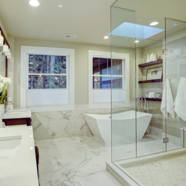 bathroom remodel with new freestanding bathtub and enclosed shower