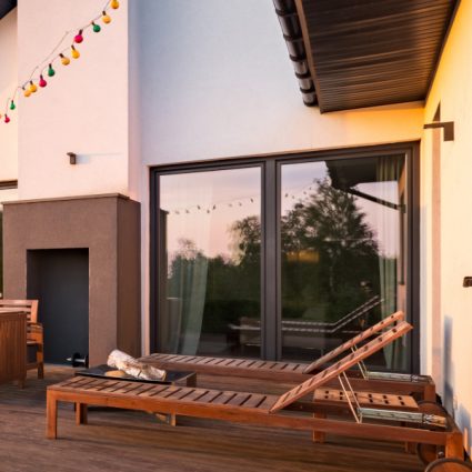 Modern house with patio and functional outdoor furniture